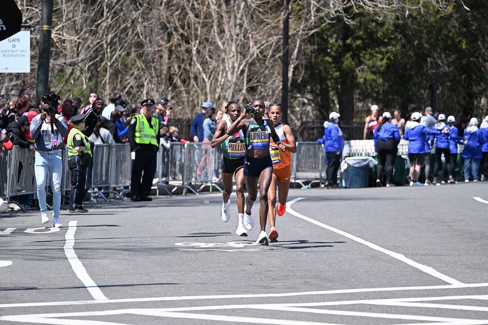 Sharon Lokedi, Hellen Obiri and Yalemzerf Yehualaw on the podium of the 2025 Boston Marathon women’s race